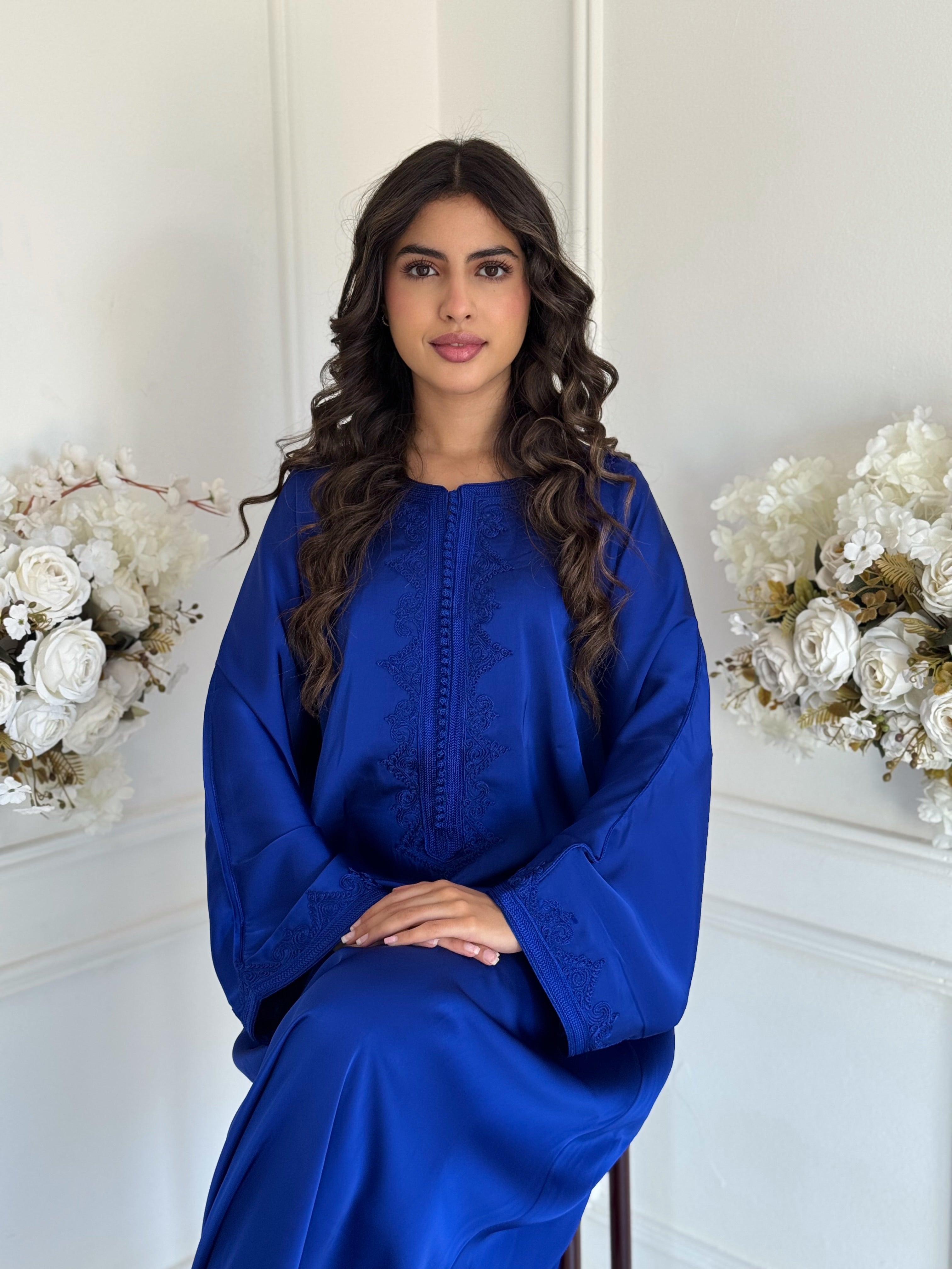 “Model wearing Gandoura Rana — royal blue drap de soie Moroccan gandoura with elegant oversized fit.”