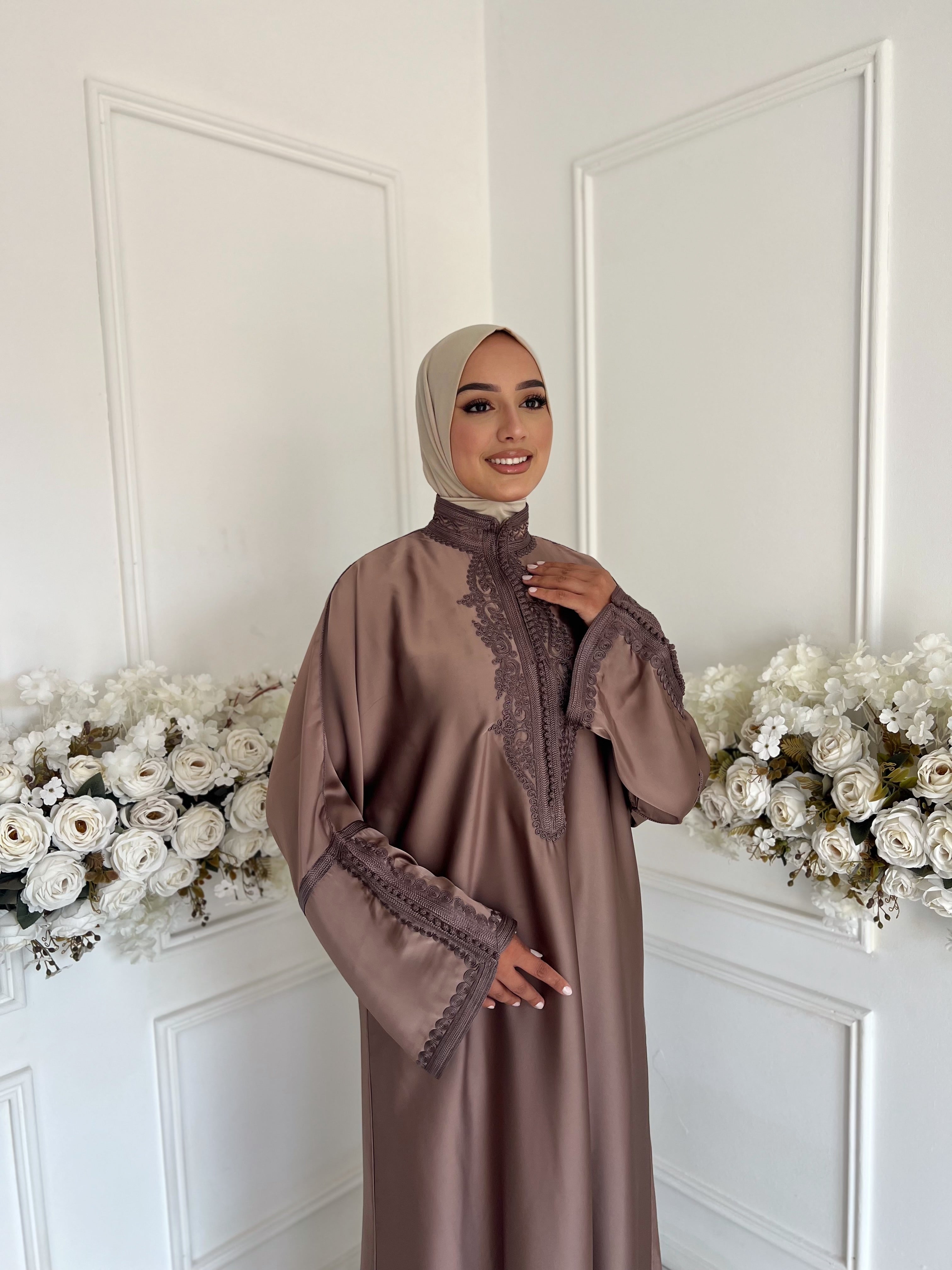 Side view of Gandoura Oumniya showing soft drape and subtle embroidery.”