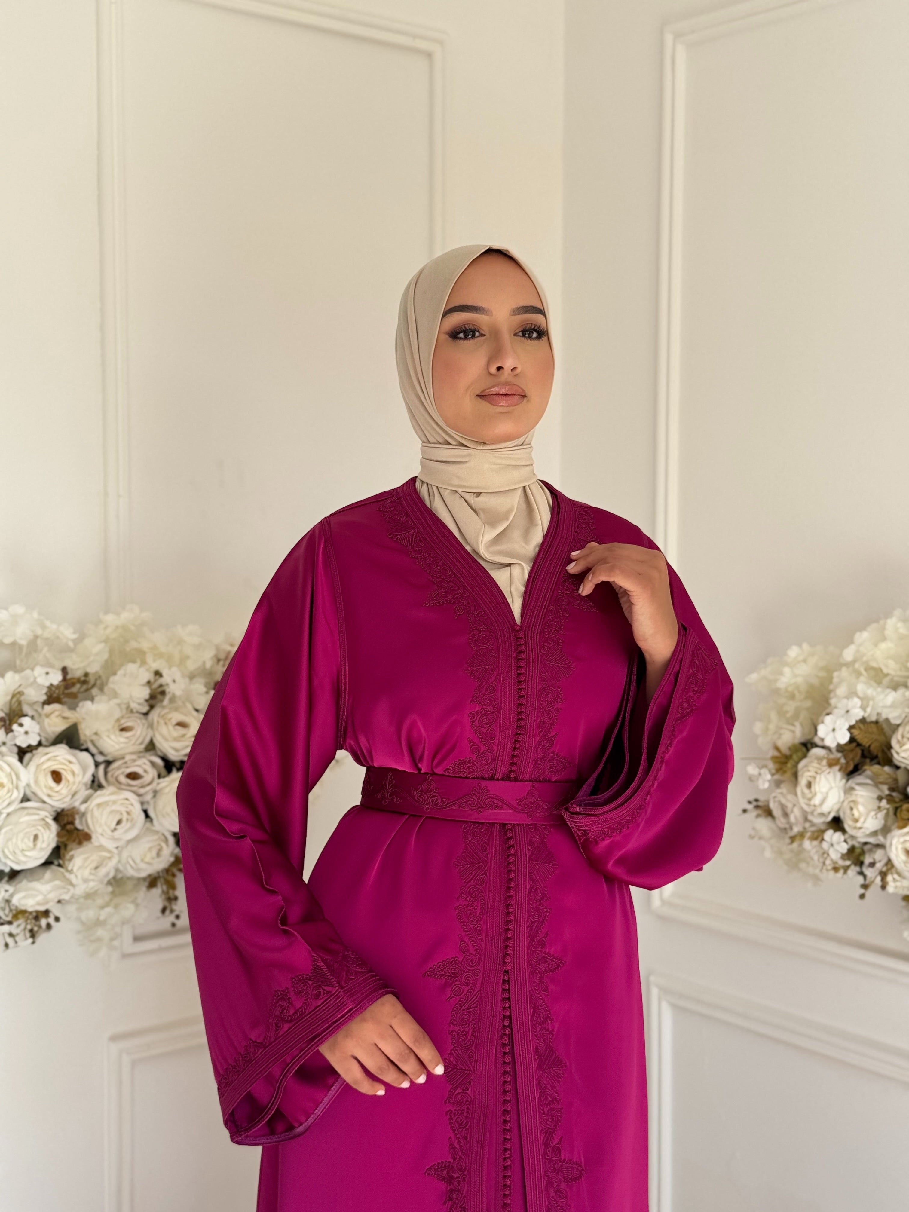 “Full-length view of Takchita Coco – elegant two-piece fuchsia Moroccan dress in drap de soie.”