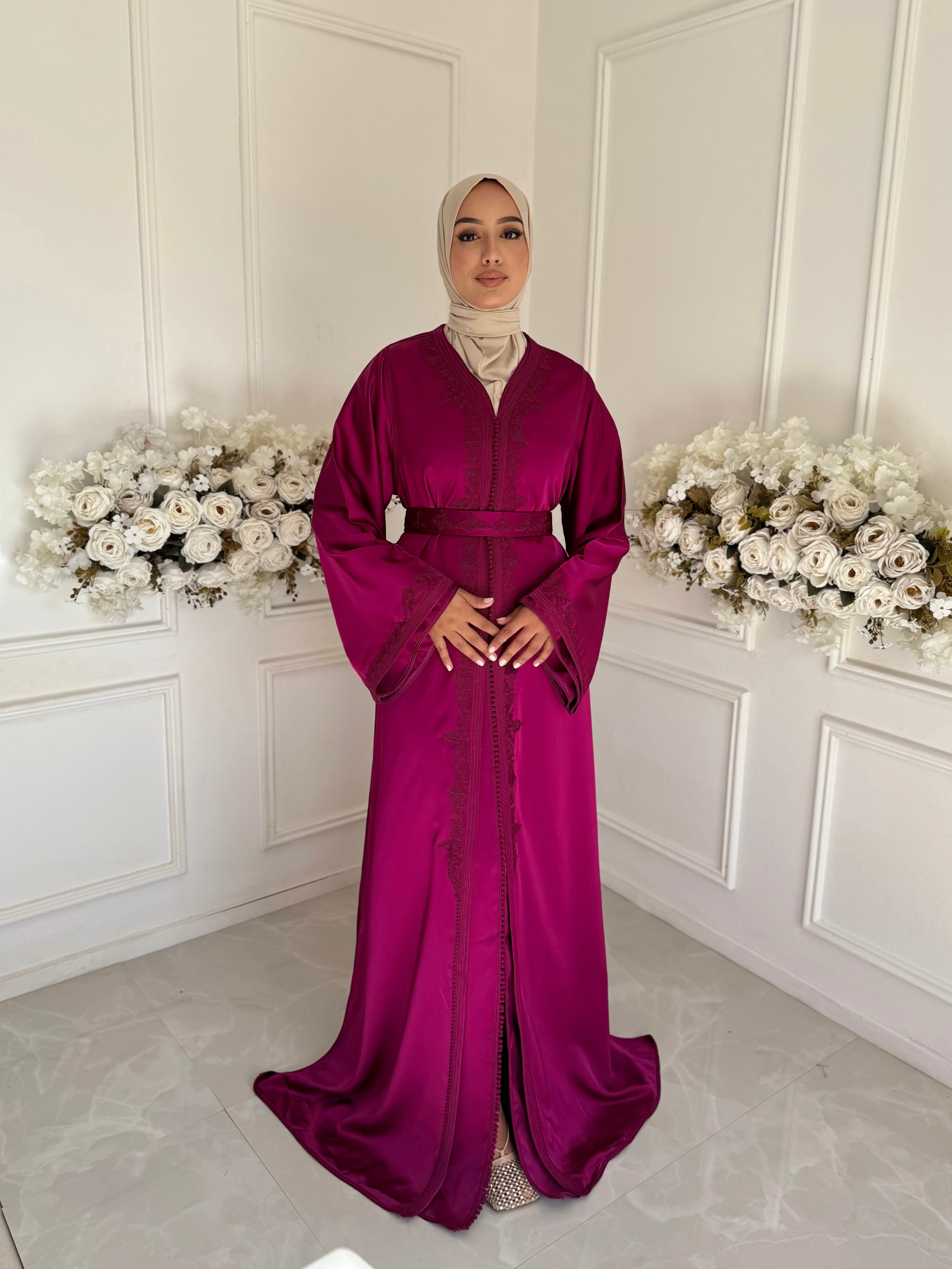 “Front view of Takchita Coco showcasing the soft flow and rich texture of drap de soie fabric.”