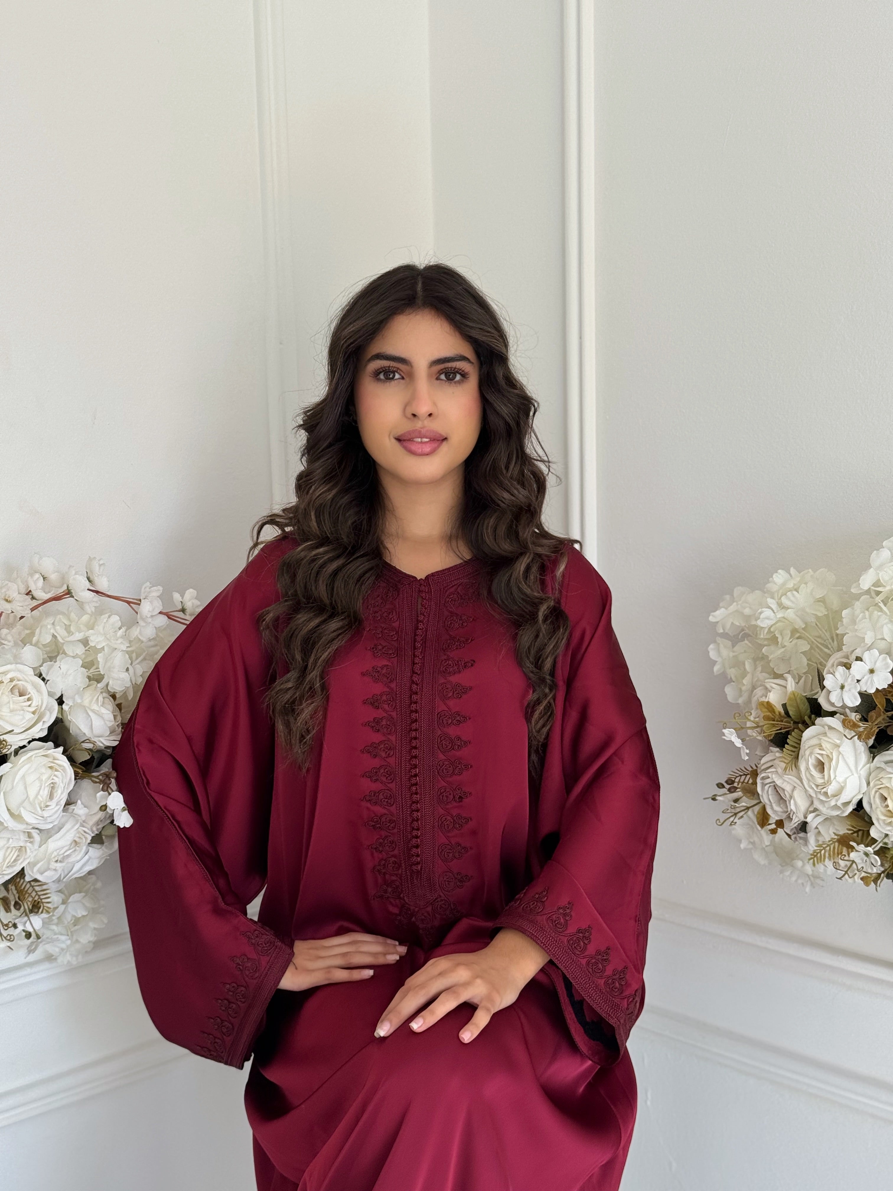 “Full view of Gandoura Maryam in rich burgundy satin, Moroccan gandoura handmade with delicate embroidery.”