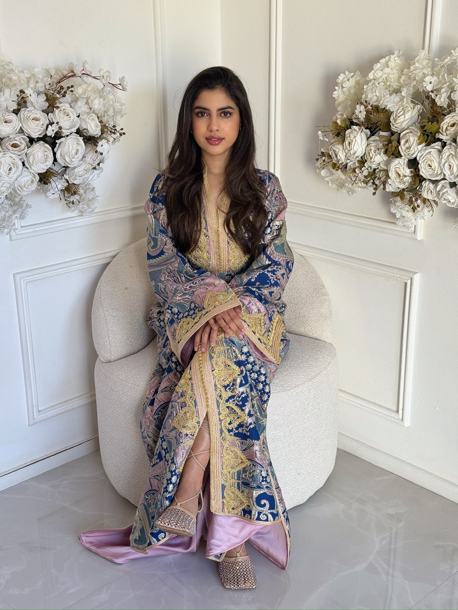 Elegant Moroccan brocade caftan worn for weddings, Eid, and special occasions.