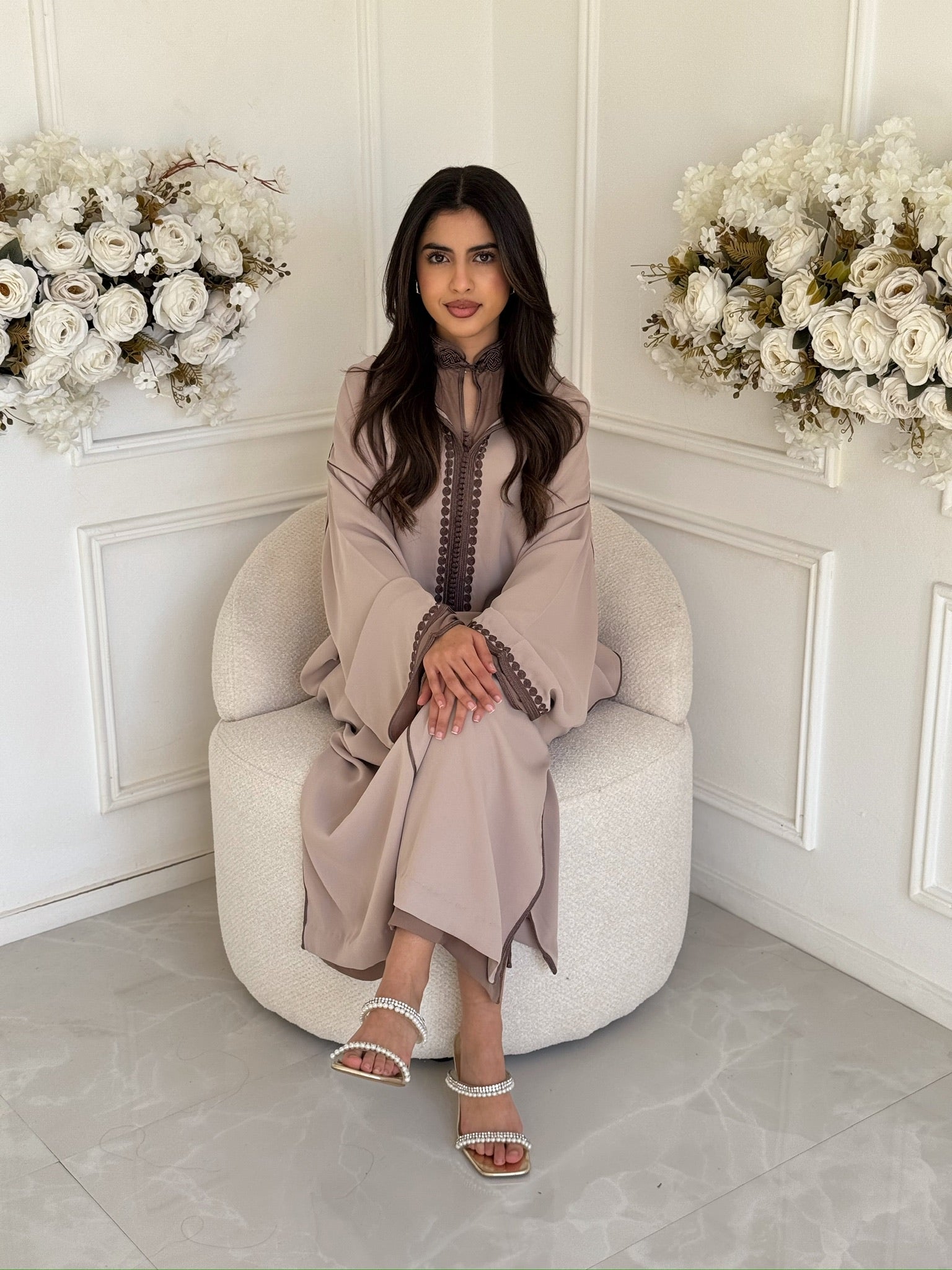 Elegant Moroccan jellaba for women with a soft flowing silhouette.