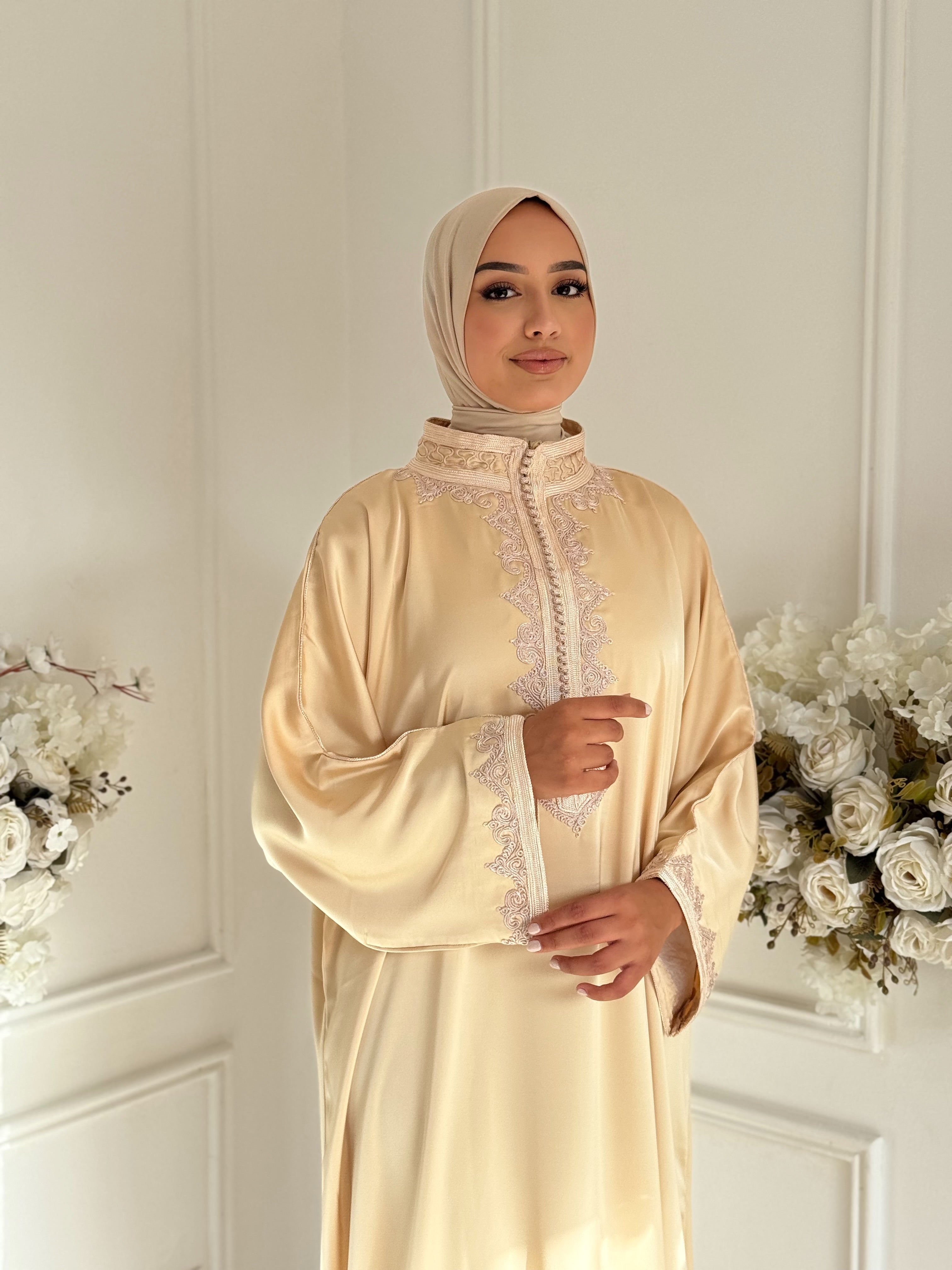 Model wearing Gandoura Aseel in soft champagne drap de soie