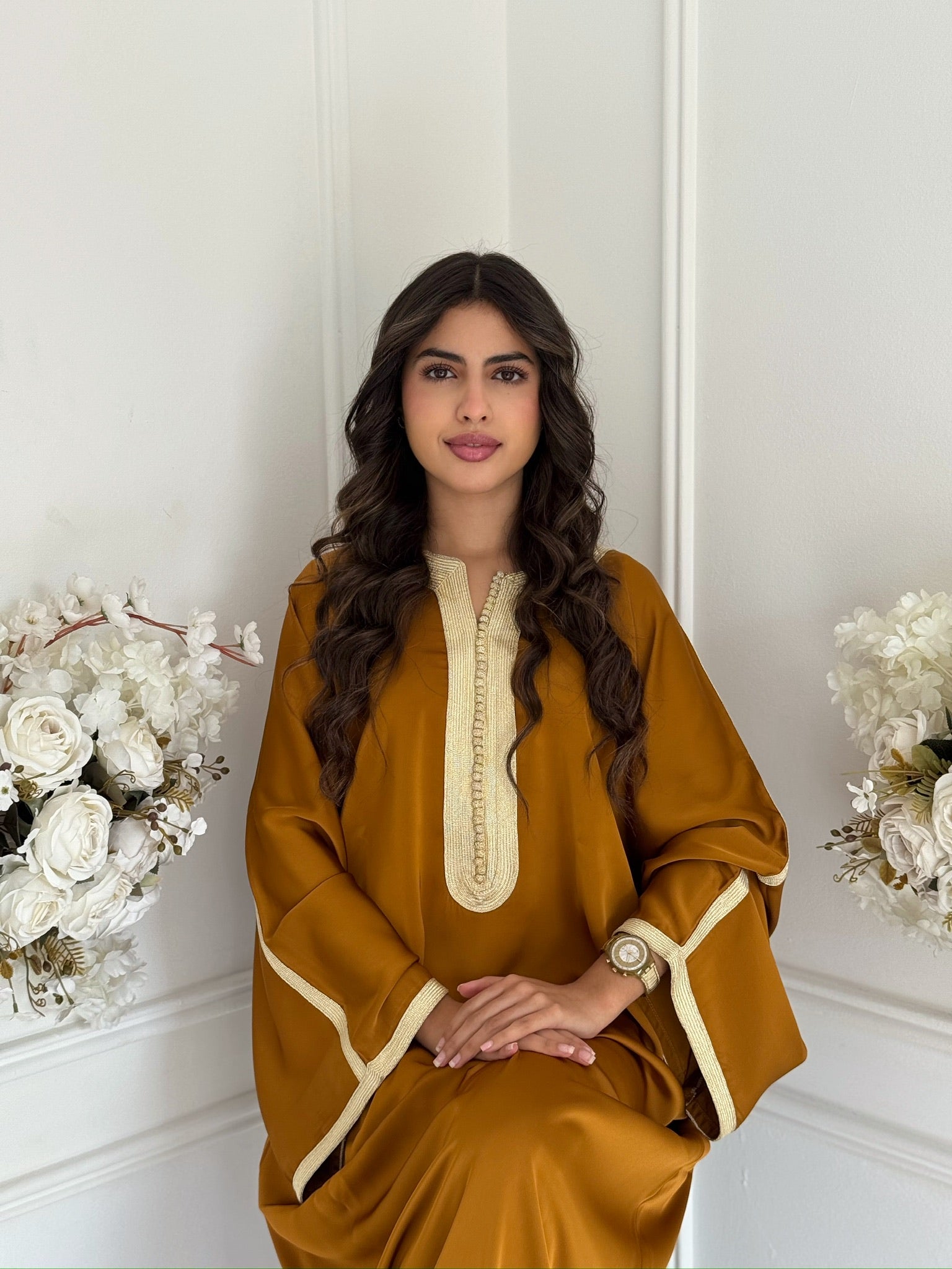 Full-length view of Gandoura Mina with elegant embroidery and flowing design.