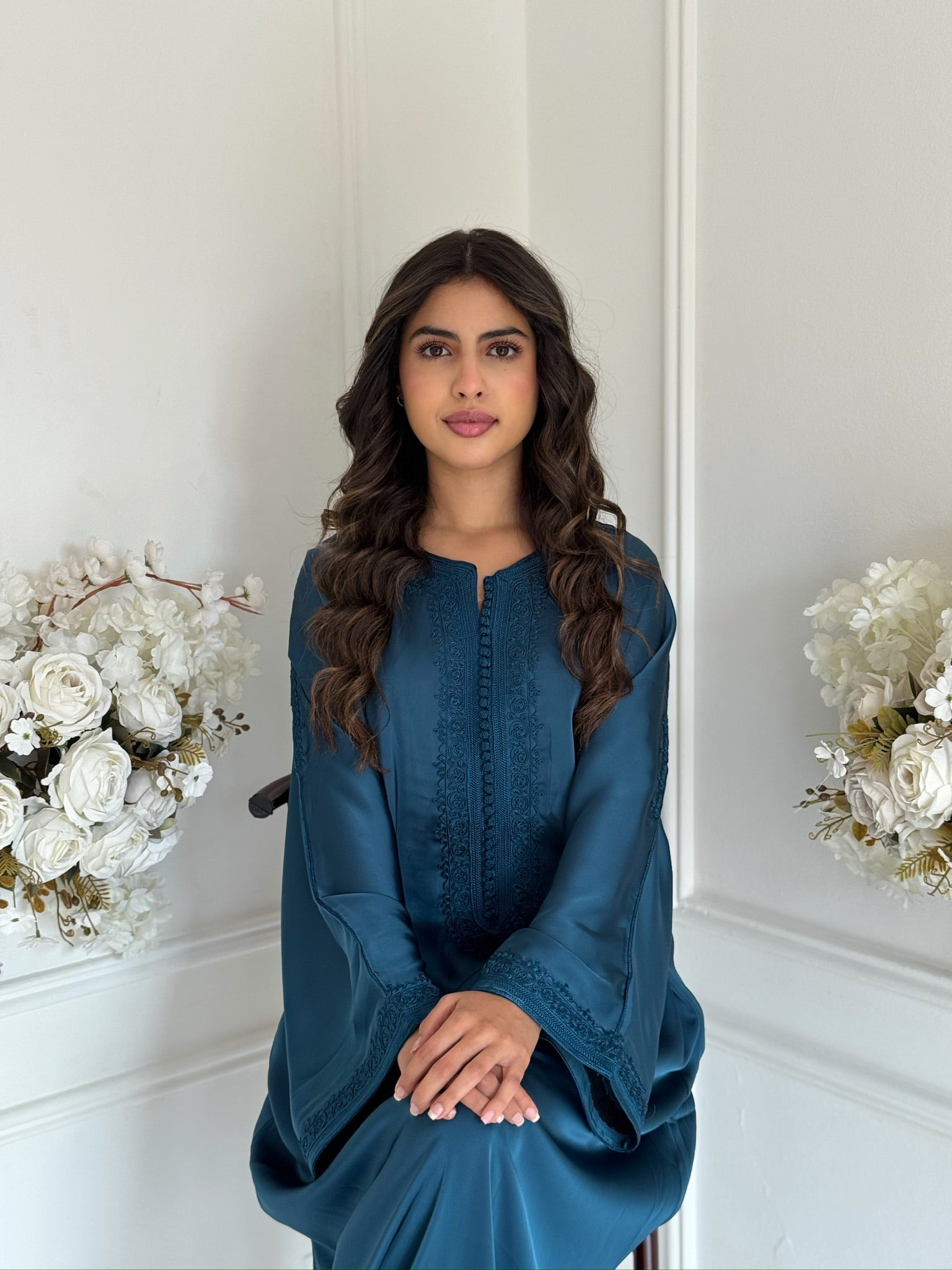 Full view of Gandoura Qamar in teal with Arabic embroidery and flowy design