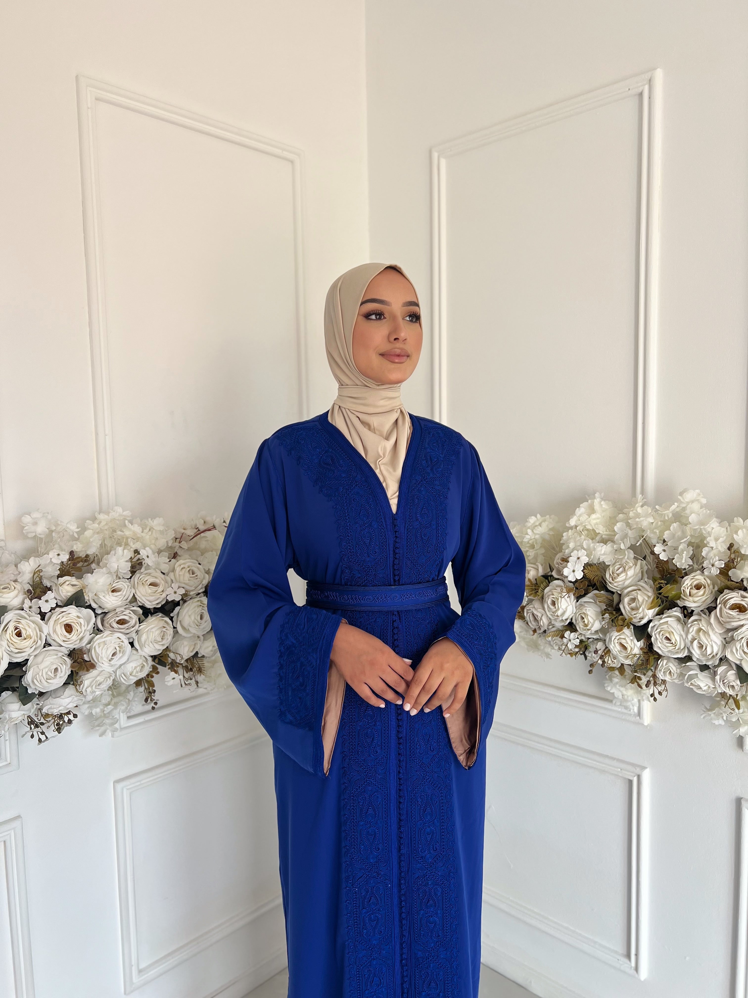 Full-length view of Caftan Mayssa – elegant royal blue Moroccan dress.