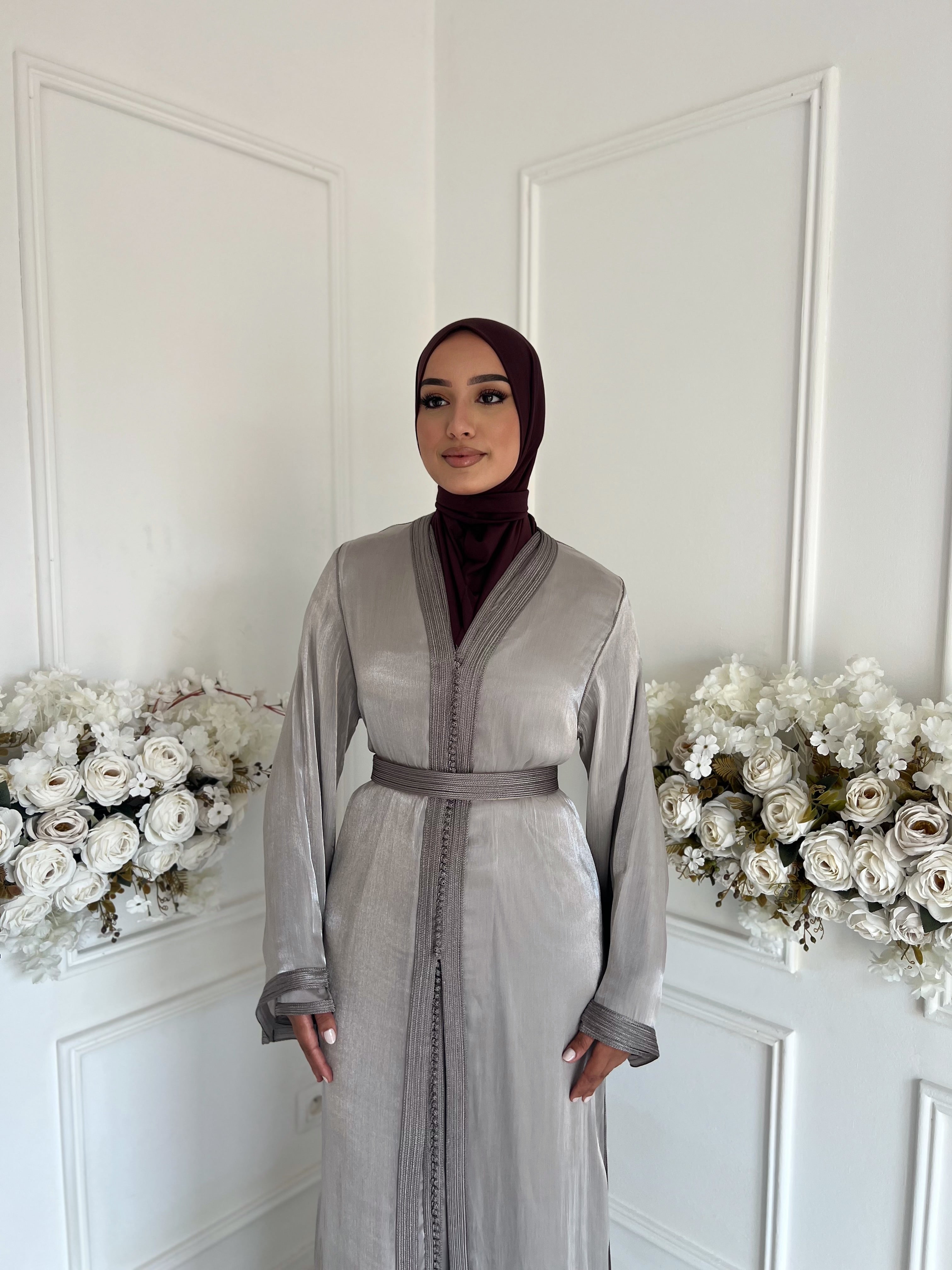 Model wearing the Takchita Ayah Moroccan dress in silver and taupe organza.