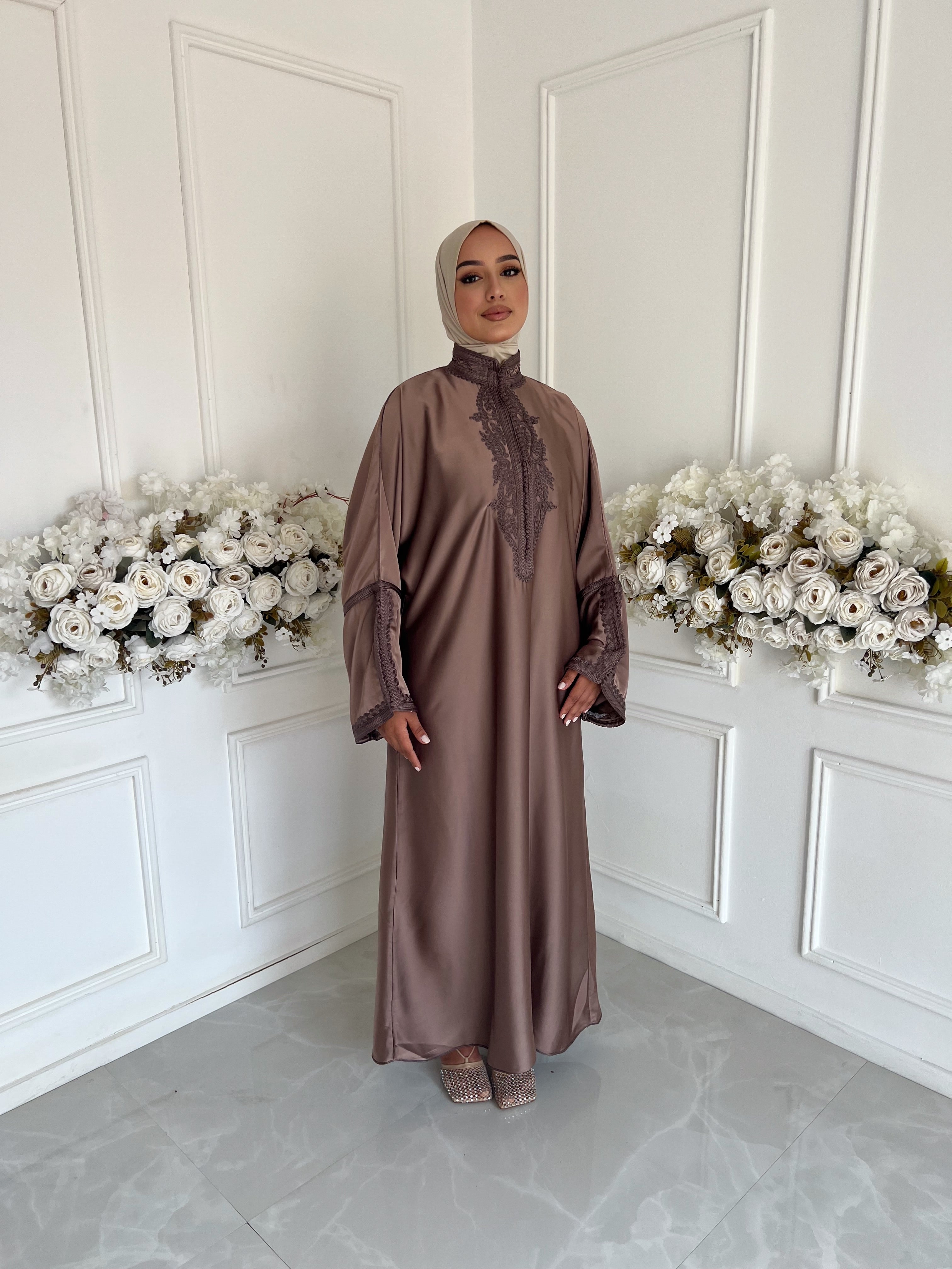 Full-length view of Gandoura Oumniya – elegant taupe Moroccan dress for special occasions.”
