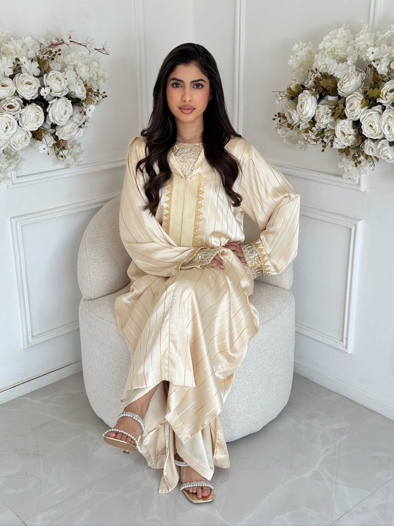 Luxury Moroccan jellaba for women in ivory with elegant embroidery
